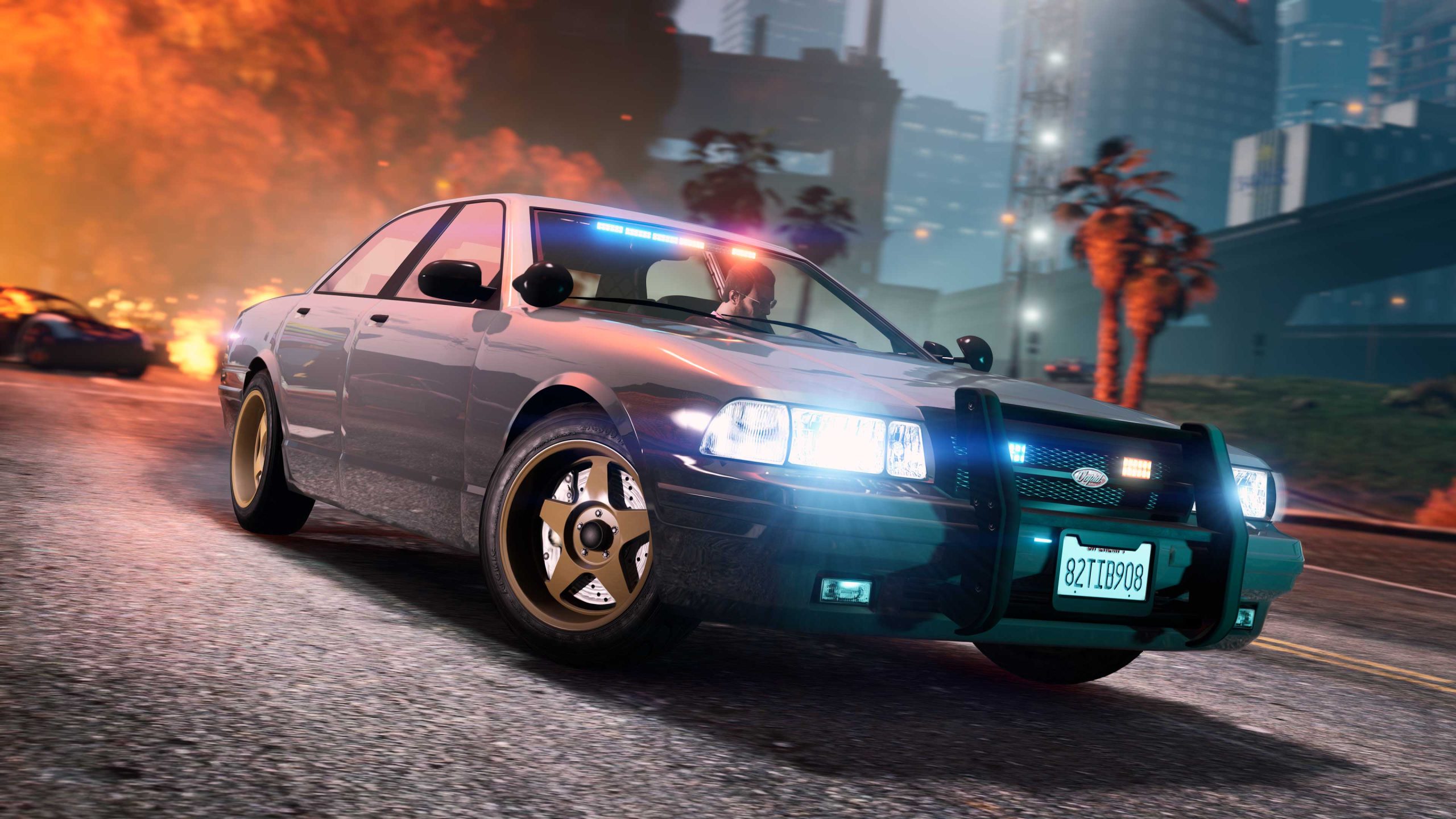 A grey Vapid Unmarked Cruiser drives fast with a strip of police lights flashing from inside.