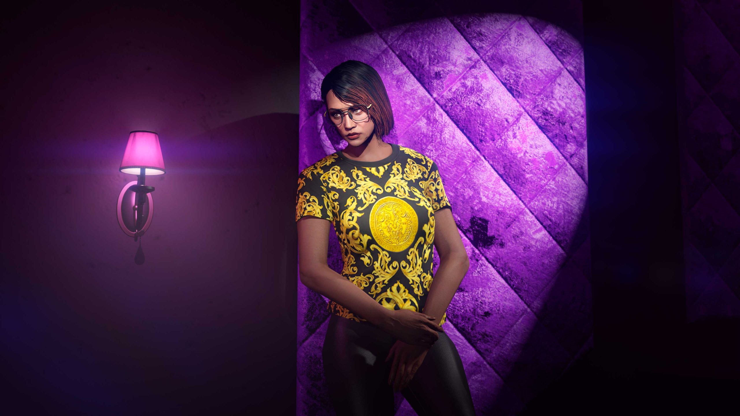 A GTA Online character stands against a diamond textured wall, lit by a purple spotlight, wearing the Black Santo Capra Ornate Tee.