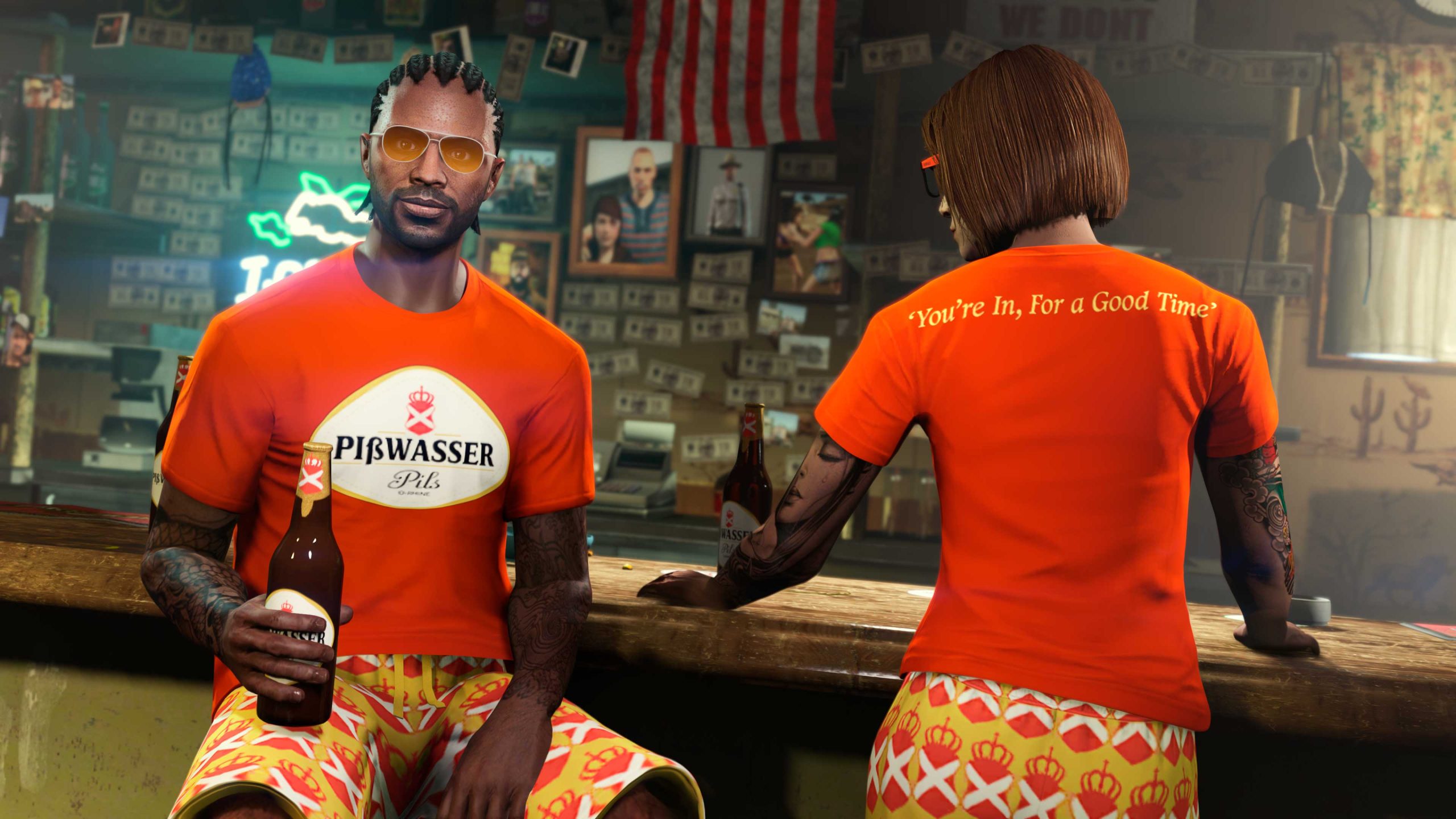 Two GTA Online characters drinking at a bar wearing the Pißwasser Good Time Tee and the Gold Pißwasser Shorts. 