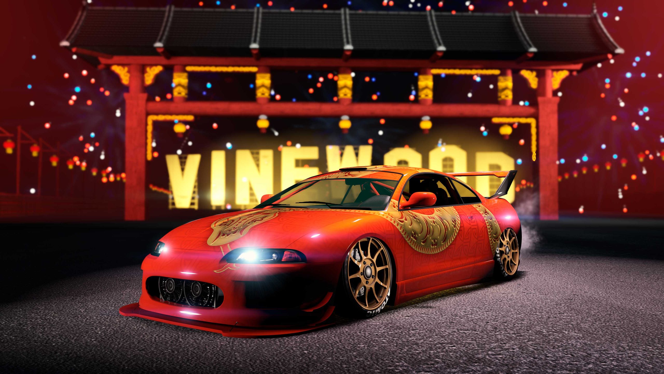 An orange Maibatsu Penumbra FF with a golden snake Lunar New Year livery parked in front of a golden Vinewood sign. 